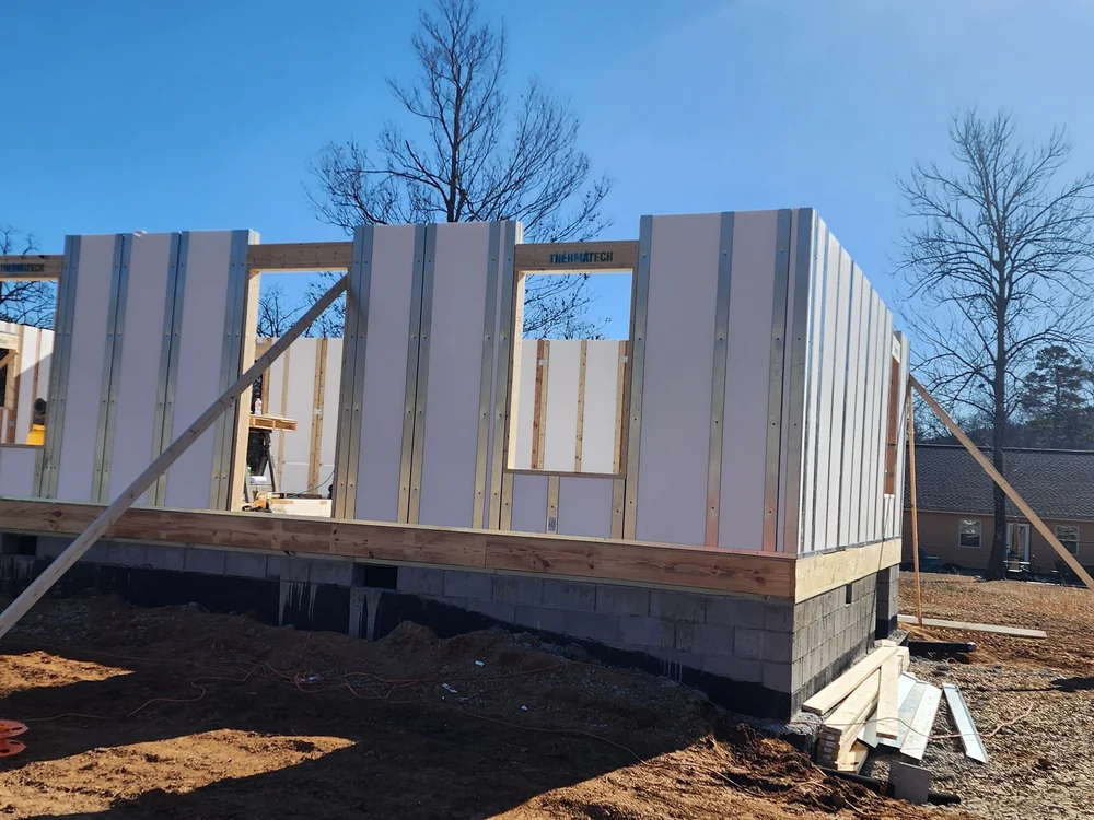 Multiple walls up with door and window bucks