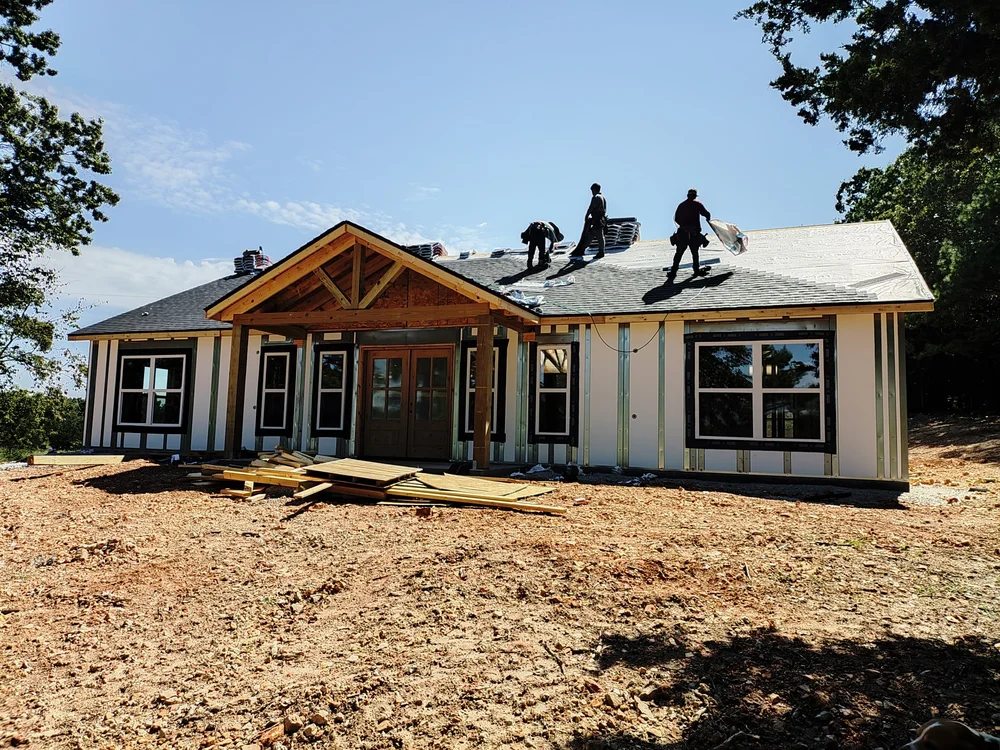 Panelized retrofit on arched hangar building